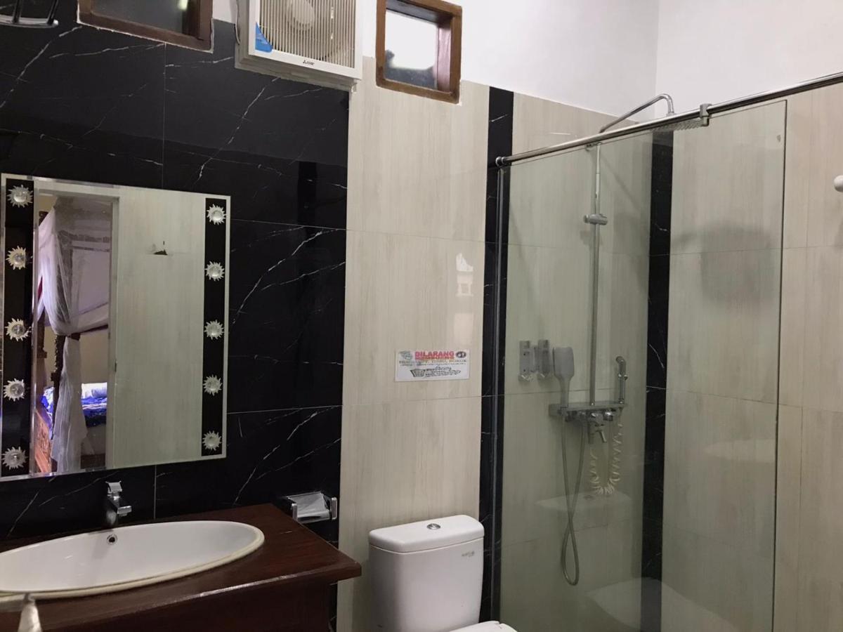 Thomas' Retreat Bukit Lawang Hotell Rom bilde