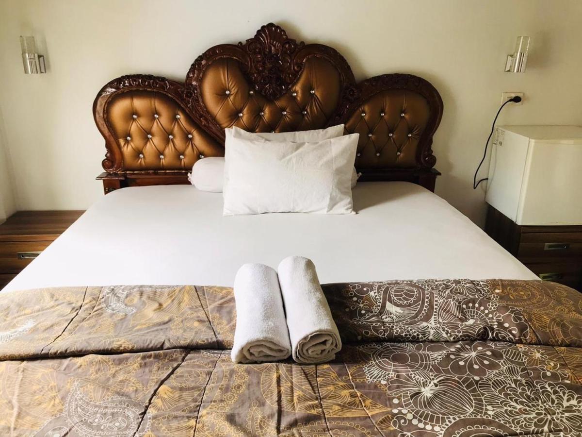 Thomas' Retreat Bukit Lawang Hotell Rom bilde